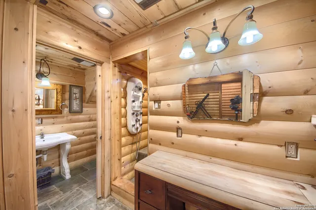 a locker room with washer and dryer