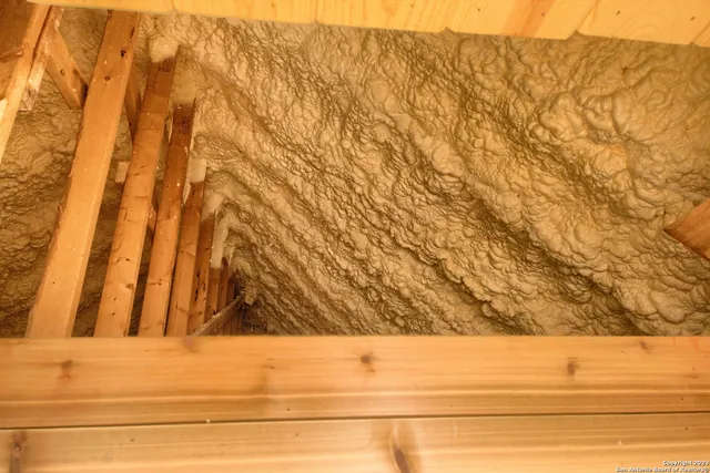 a view of wooden floor and a road