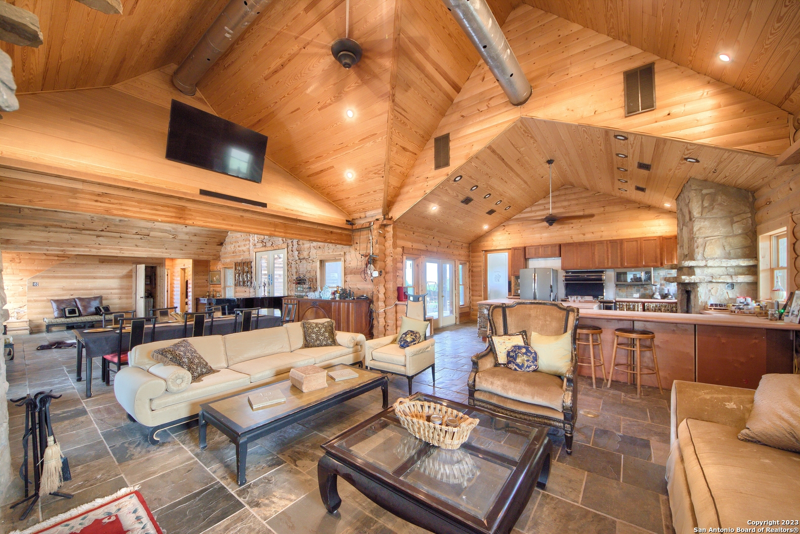 514 Centerfork Road Doss, TX 78618 - Photo 6 of 51 a living room with lots of furniture and a flat screen tv