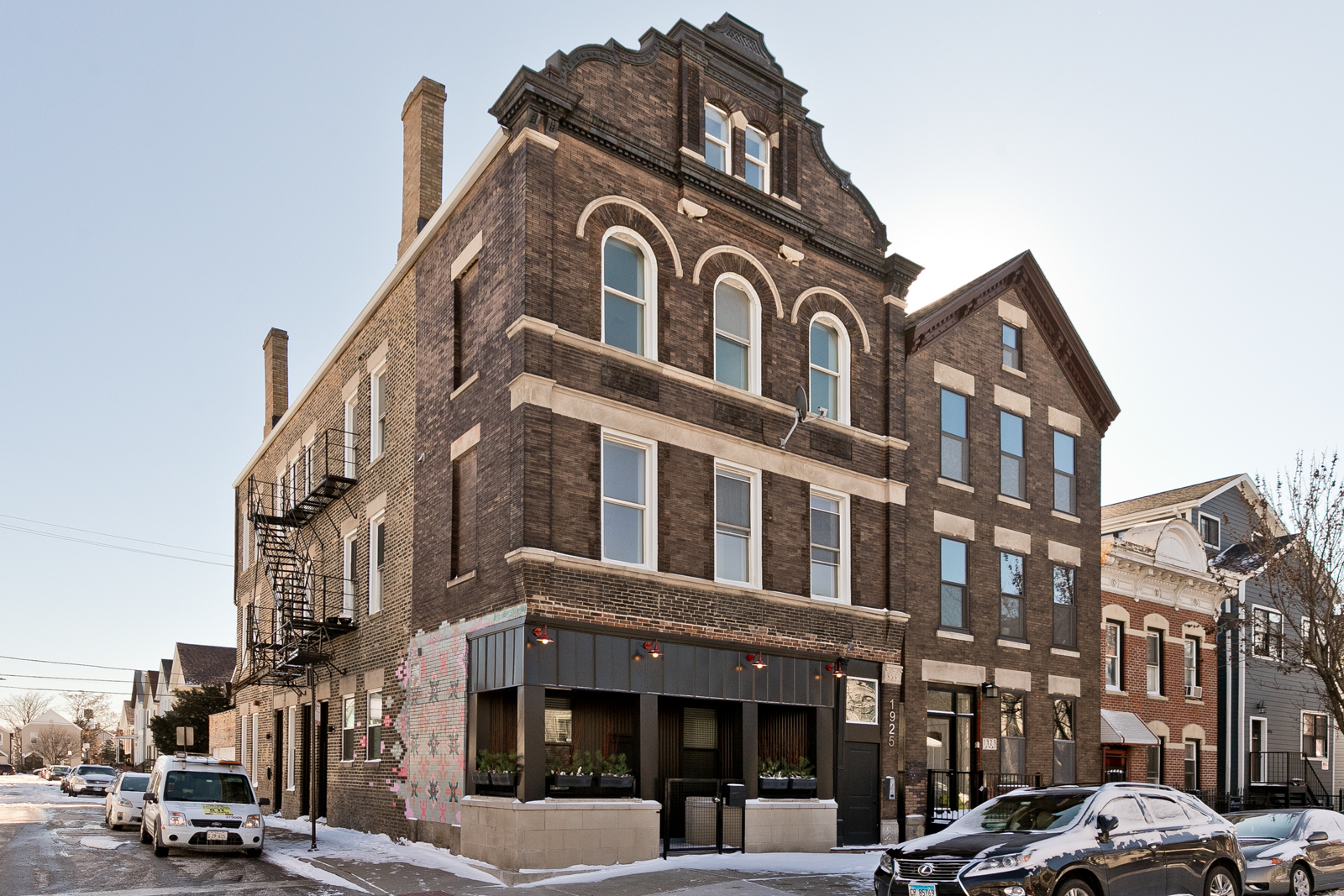 a view of a building with a street