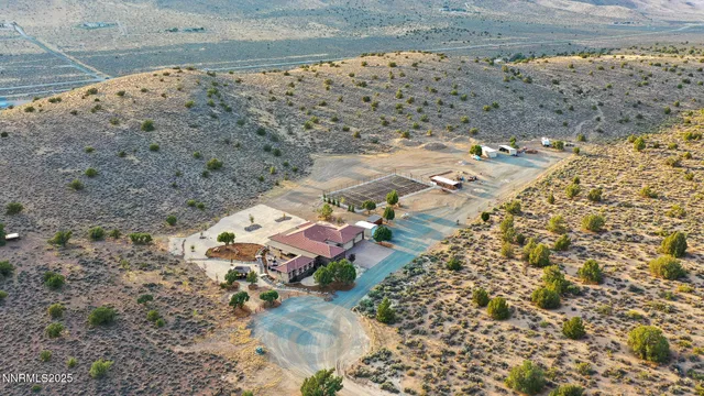 a aerial view of house with a yard