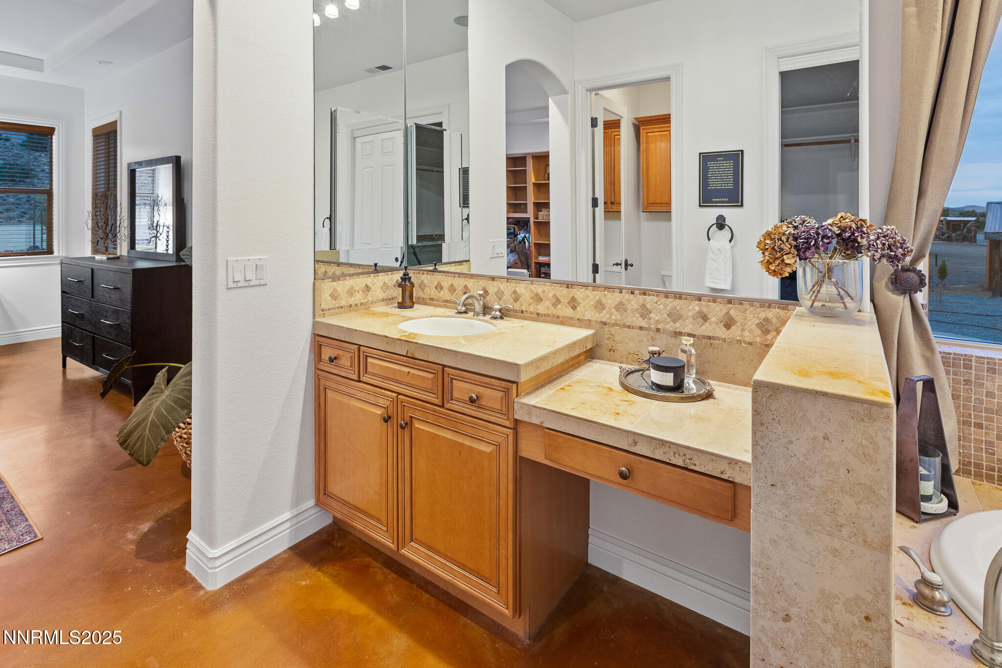 6805 Sage Canyon Road Reno, NV 89510 - Photo 21 of 40 a bathroom with a sink double vanity and a mirror