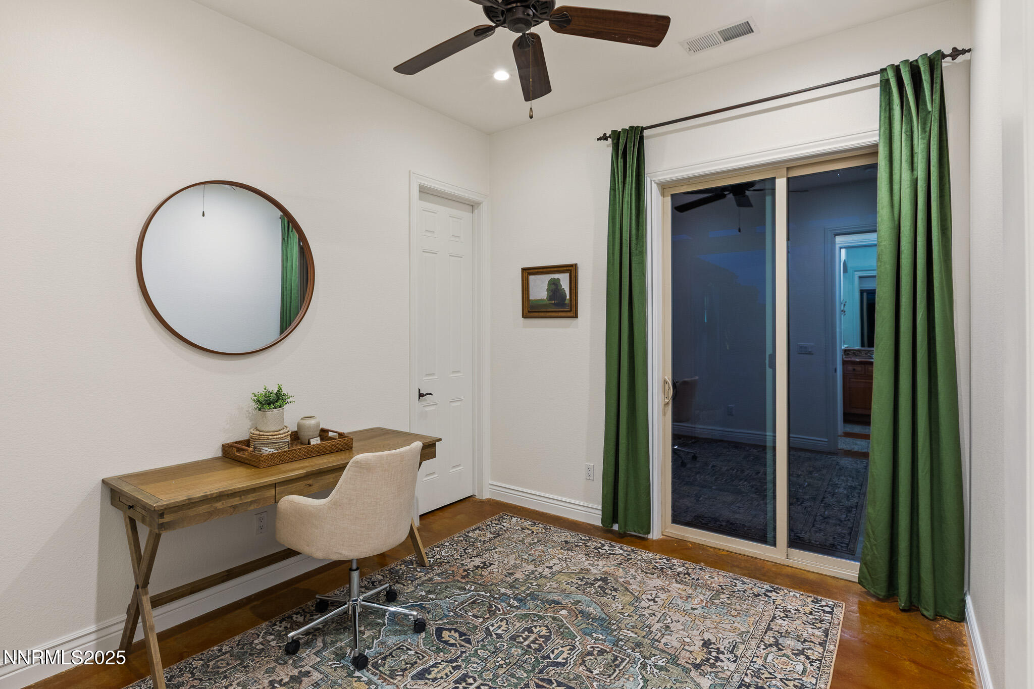6805 Sage Canyon Road Reno, NV 89510 - Photo 24 of 40 a living room with a couch and a window