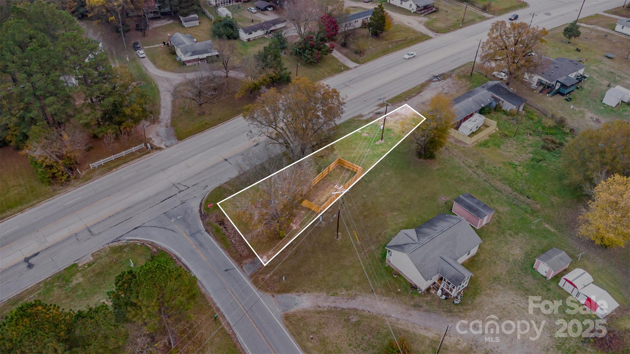 an aerial view of a house with outdoor space
