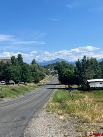 a view of a golf course with a lake