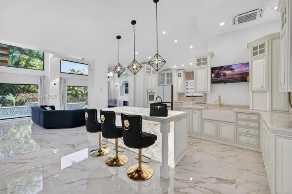 a view of entryway with stairs and wooden floor