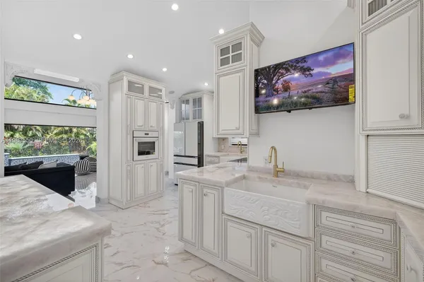 a vase of flowers sitting on a table