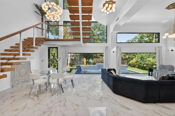 a bathroom with a bathtub and a window