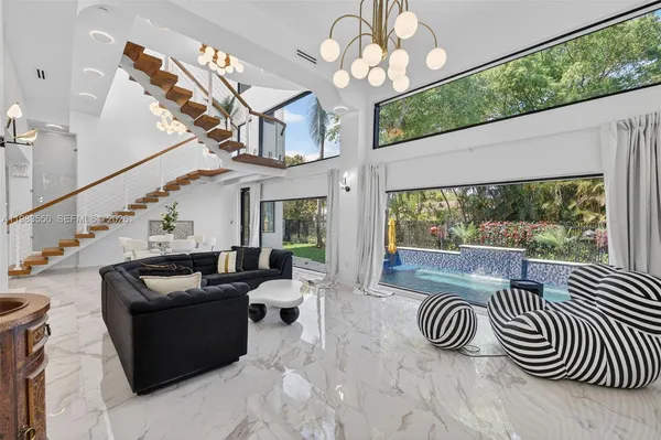 a bedroom with a bed and a mirror