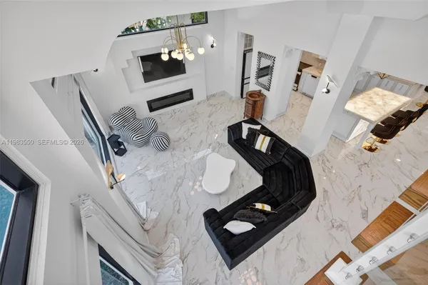 a bathroom with a sink a mirror and a bathtub