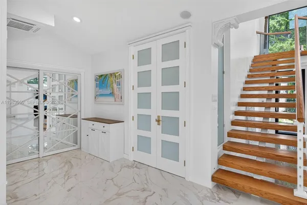 a bathroom with a sink a toilet and a bathtub