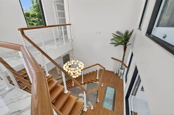 a view of a backyard with swimming pool