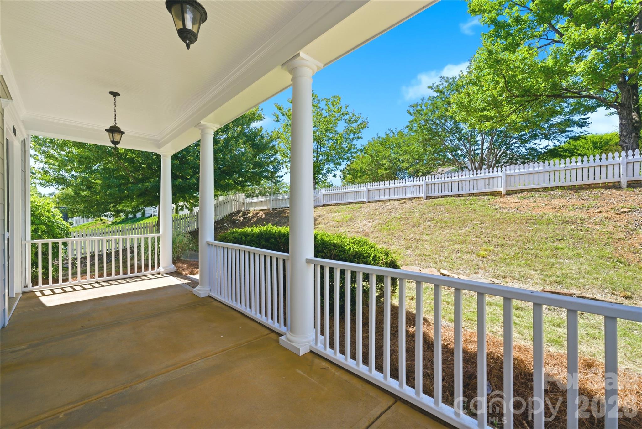 10227 Sam Meeks Road Pineville, NC 28134 - Photo 2 of 27 a view of a balcony with yard