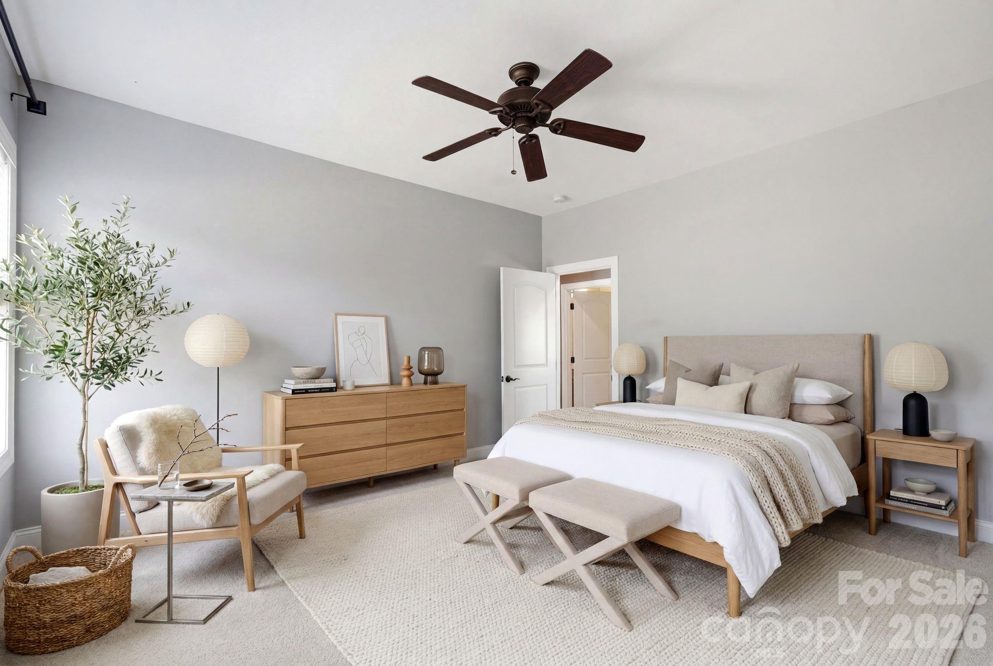 10227 Sam Meeks Road Pineville, NC 28134 - Photo 22 of 27 a bedroom with a bed and a chandelier