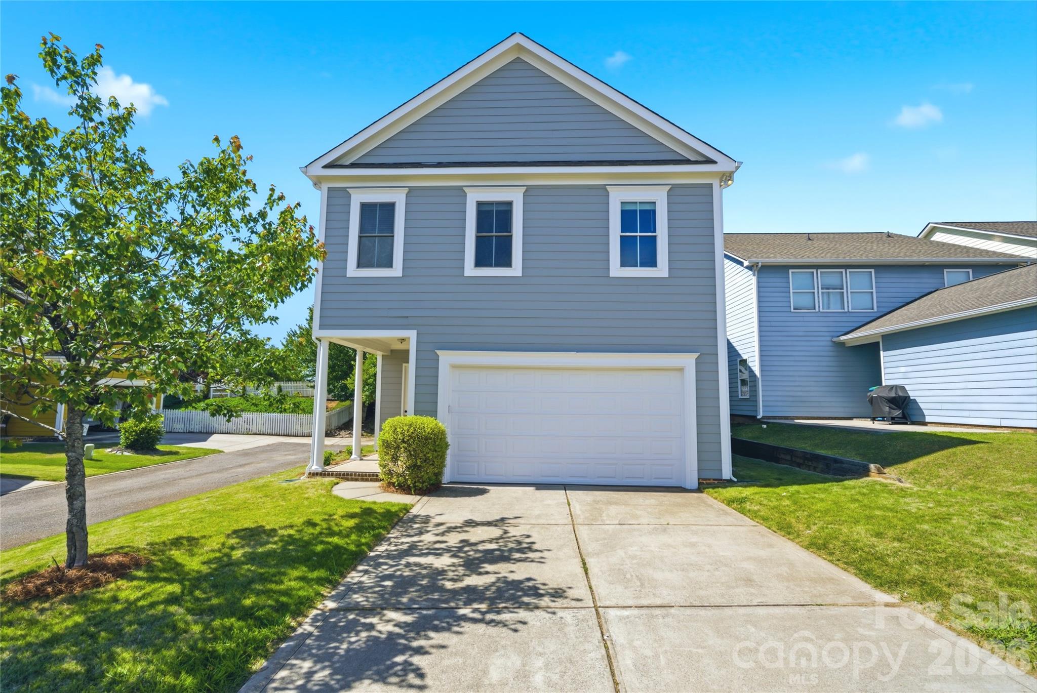 10227 Sam Meeks Road Pineville, NC 28134 - Photo 25 of 27 a front view of a house with garden