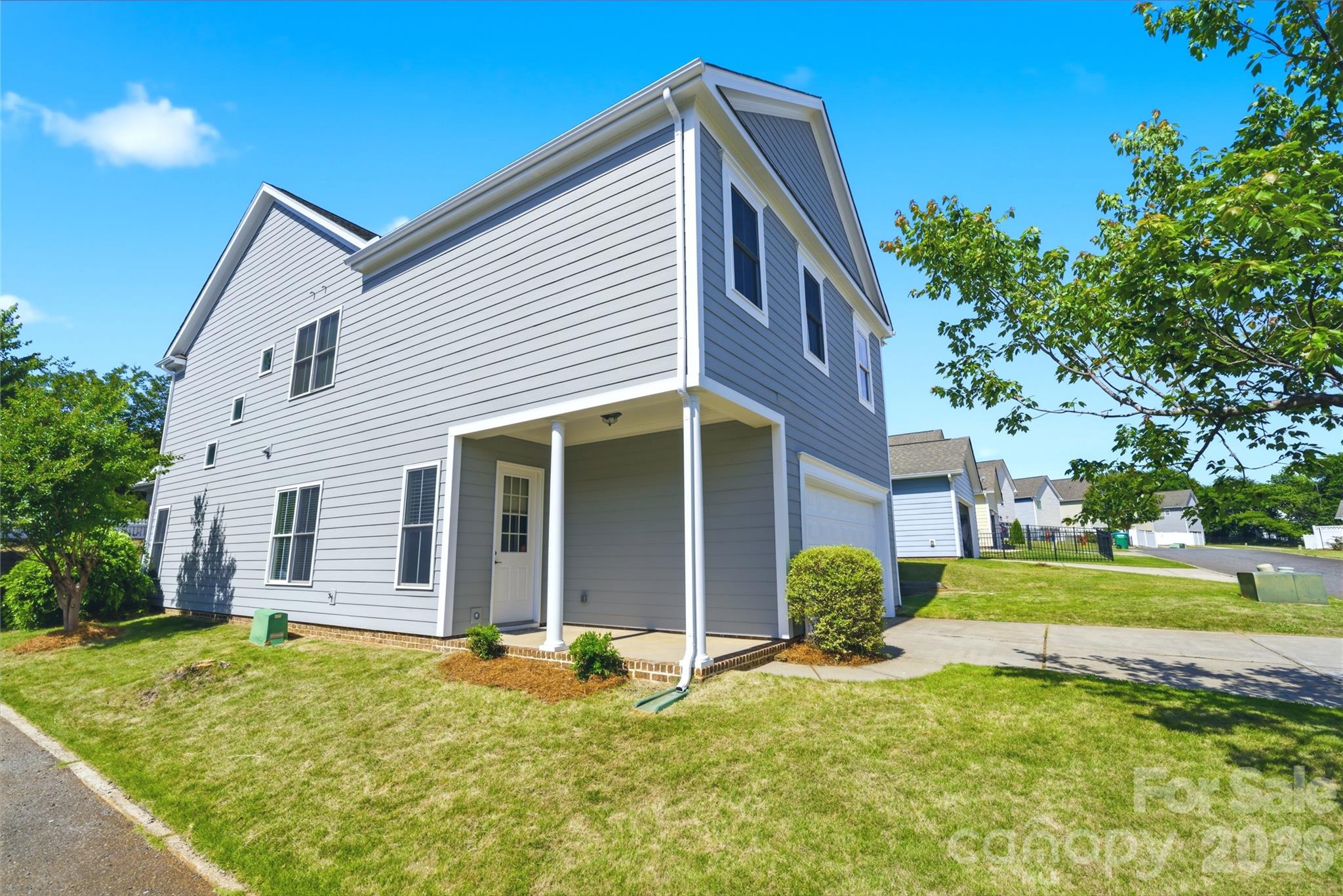 10227 Sam Meeks Road Pineville, NC 28134 - Photo 26 of 27 a view of a house with backyard and trees