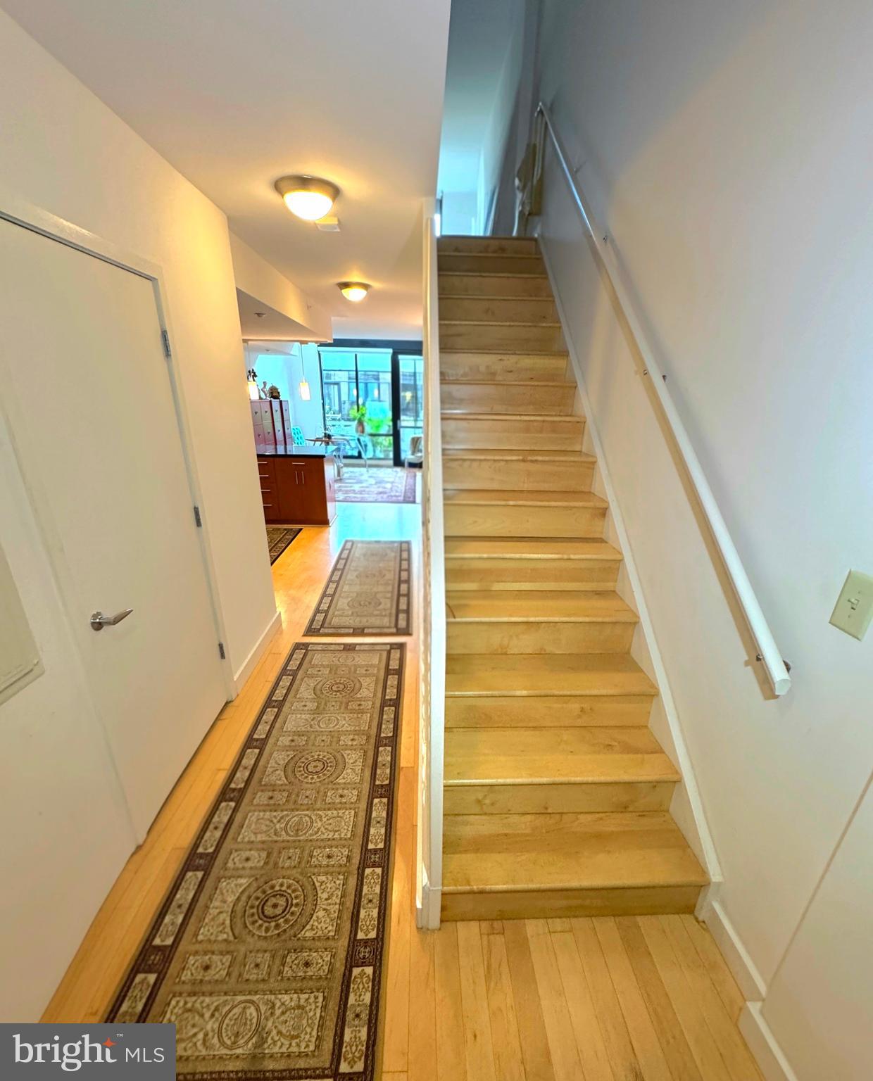912 F Street Northwest, Unit 703 Washington, DC 20004 - Photo 17 of 56 a view of entryway with wooden floor