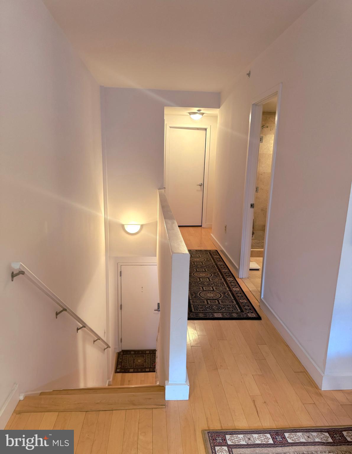 912 F Street Northwest, Unit 703 Washington, DC 20004 - Photo 21 of 52 a view of a hallway with white walls