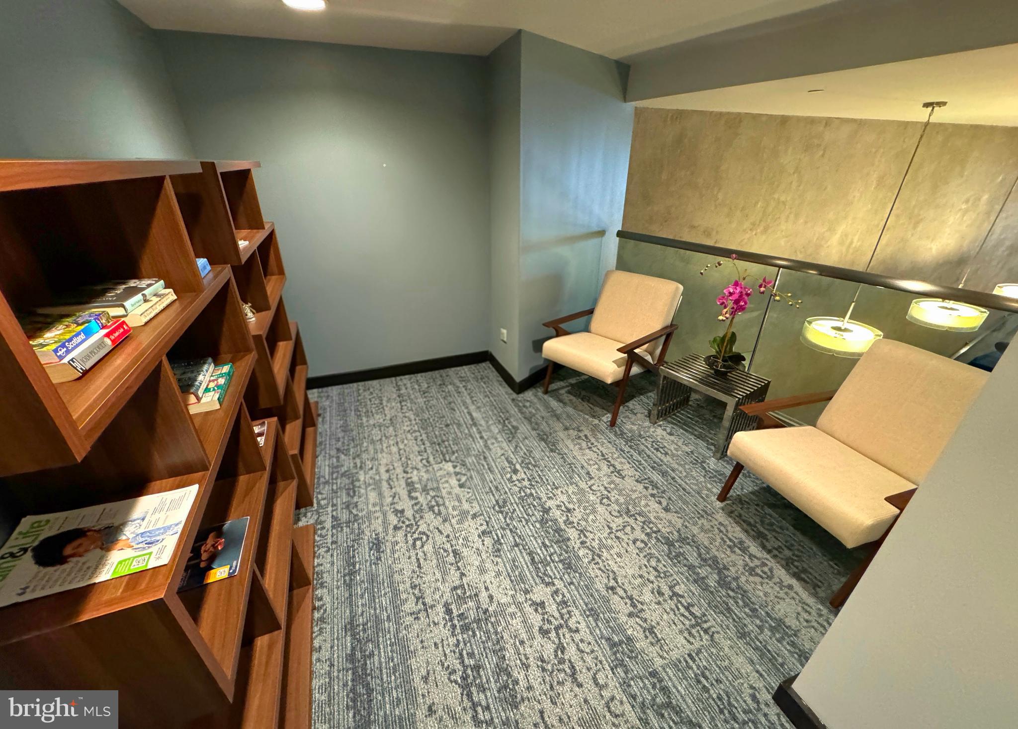 912 F Street Northwest, Unit 703 Washington, DC 20004 - Photo 29 of 56 a living room with furniture and a flat screen tv