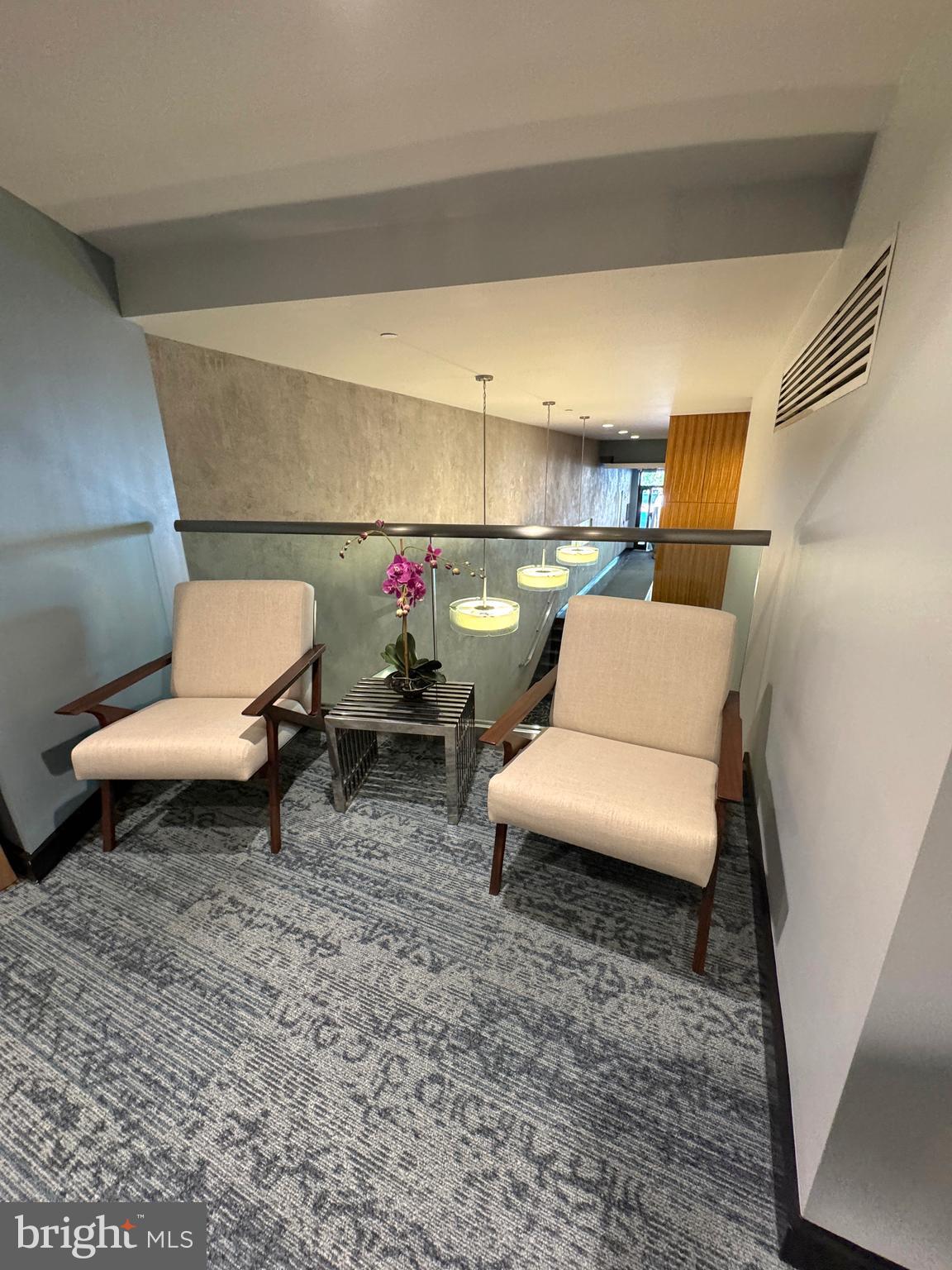 912 F Street Northwest, Unit 703 Washington, DC 20004 - Photo 34 of 56 a living room with furniture and a couch