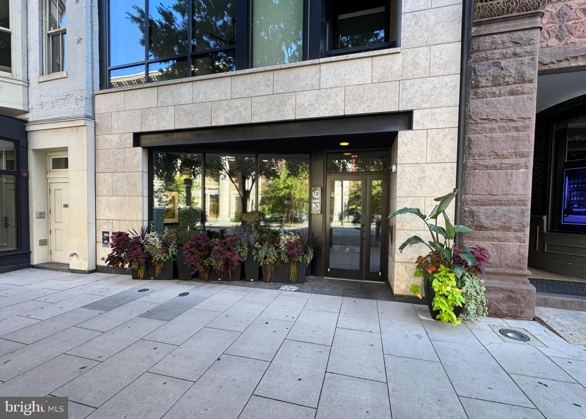 912 F Street Northwest, Unit 703 Washington, DC 20004 - Photo 42 of 52 a view of entryway with flower pots
