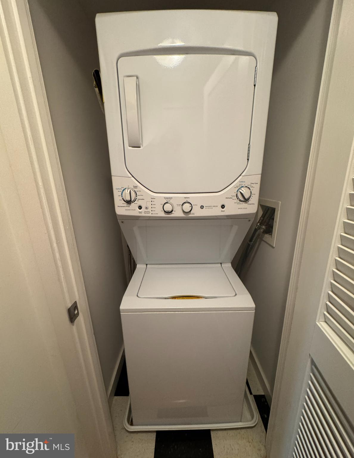 912 F Street Northwest, Unit 703 Washington, DC 20004 - Photo 46 of 52 a utility room with dryer and washer