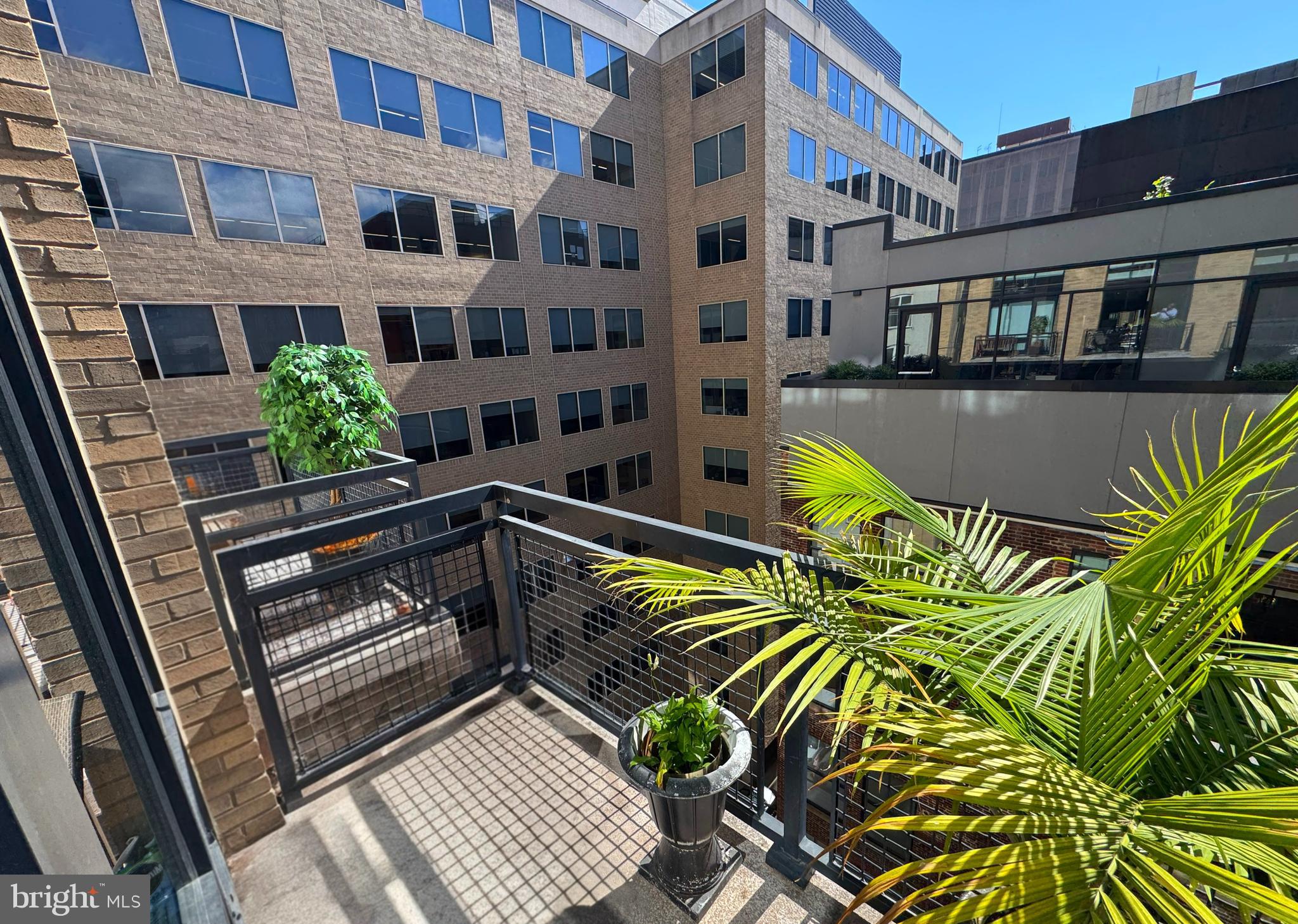 912 F Street Northwest, Unit 703 Washington, DC 20004 - Photo 9 of 52 a view of balcony with two chairs