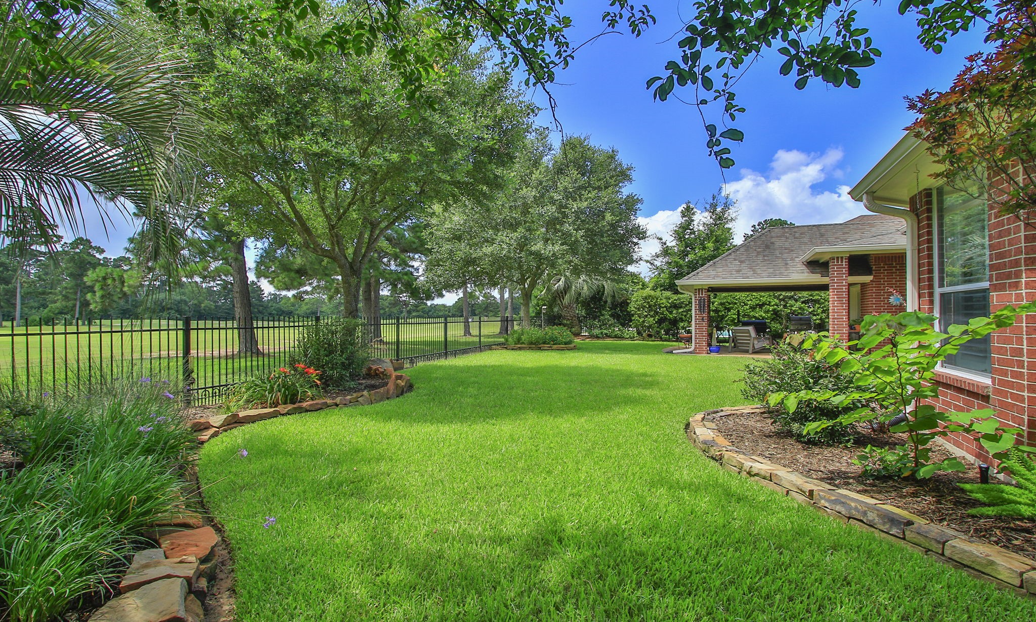 20110 Stormy Pine Lane Spring, TX 77379 - Photo 36 of 44 Enjoy the added bonus of a beautiful, lush landscape, mature shade trees and the convenient of an automatic sprinkler system.