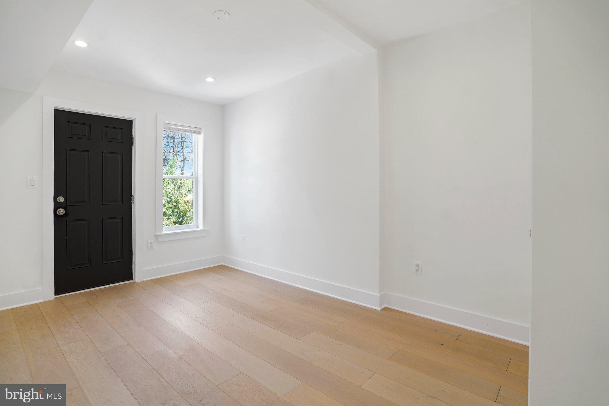 112 V Street Northeast Washington, DC 20002 - Photo 17 of 25 a view of an empty room with a window
