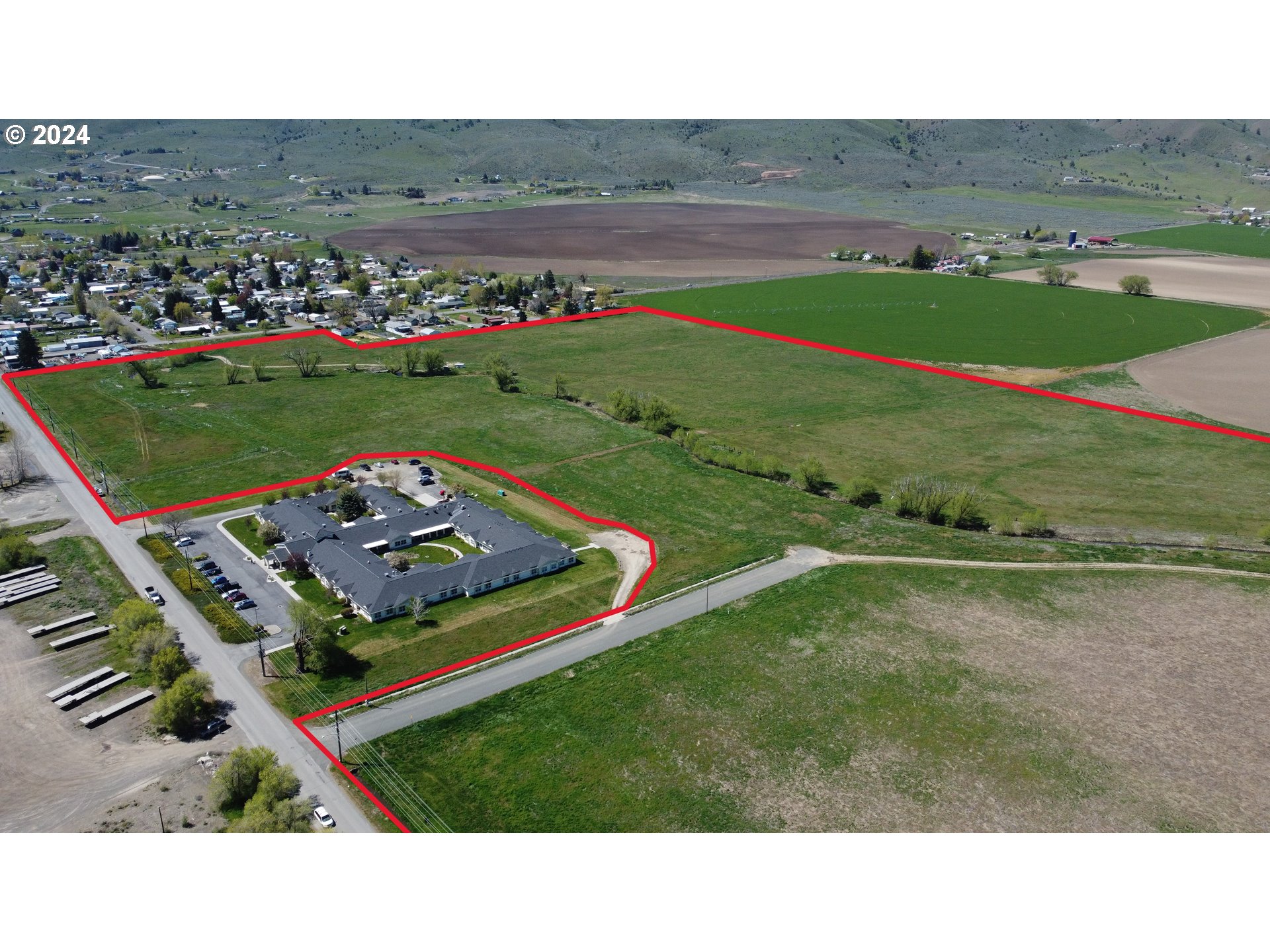 0 17th Street Baker City, OR 97814 - Photo 6 of 10 a black and white photo of a field