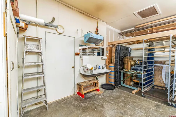a storage room with washer and dryer