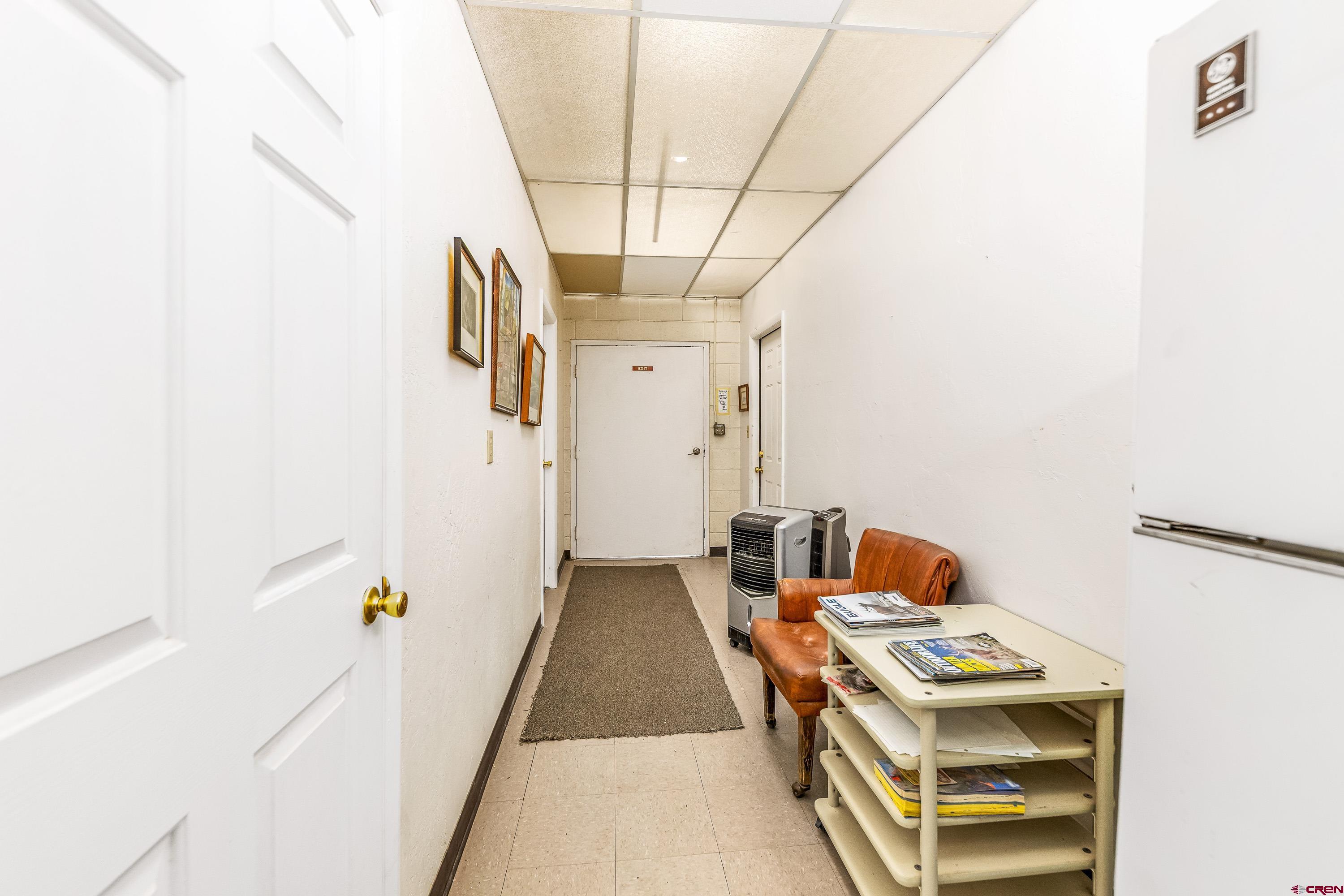 875 West Main Street Cedaredge, CO 81413 - Photo 20 of 35 a very nice looking room with a white bed