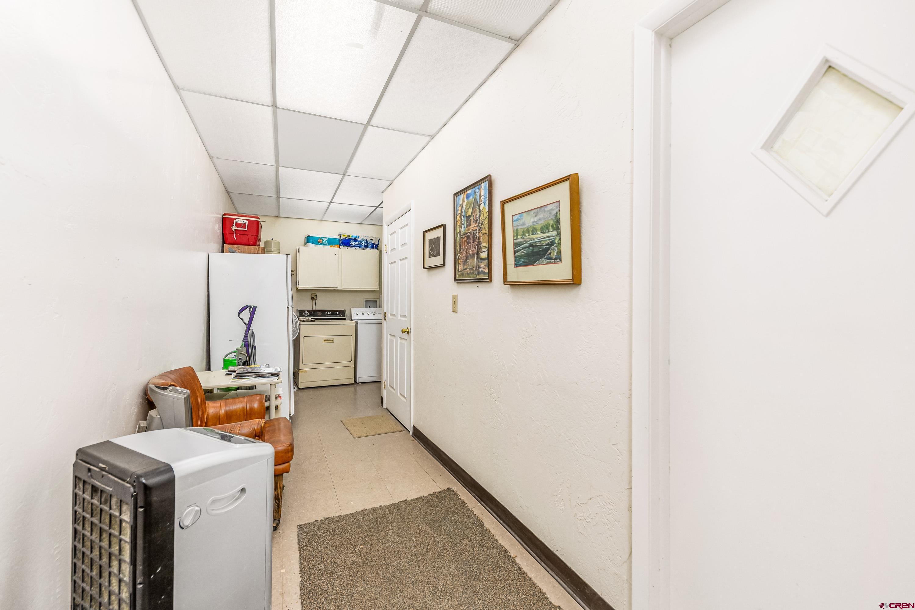 875 West Main Street Cedaredge, CO 81413 - Photo 21 of 35 a utility room with dryer and washer