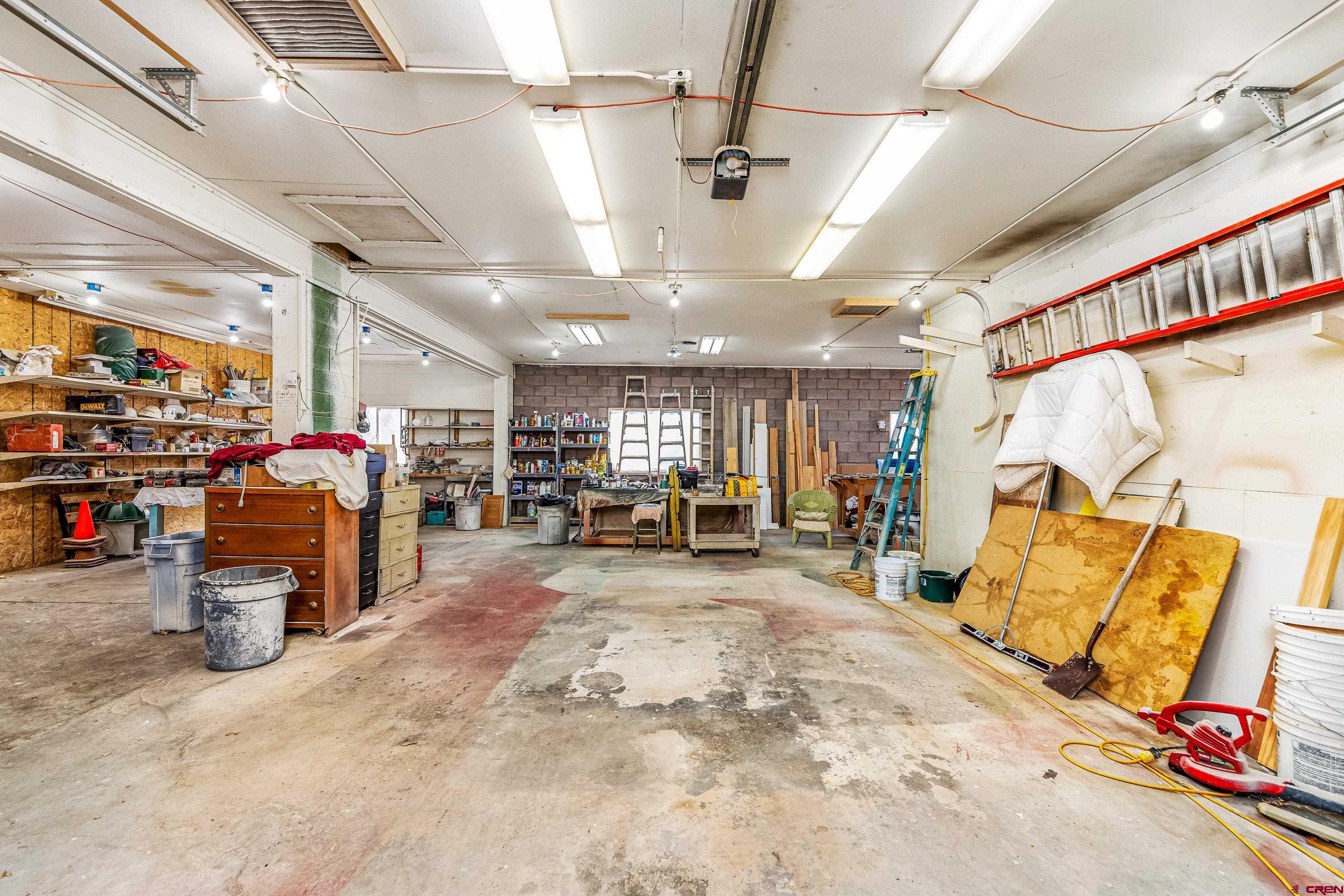 875 West Main Street Cedaredge, CO 81413 - Photo 23 of 35 a view of parking garage with cars