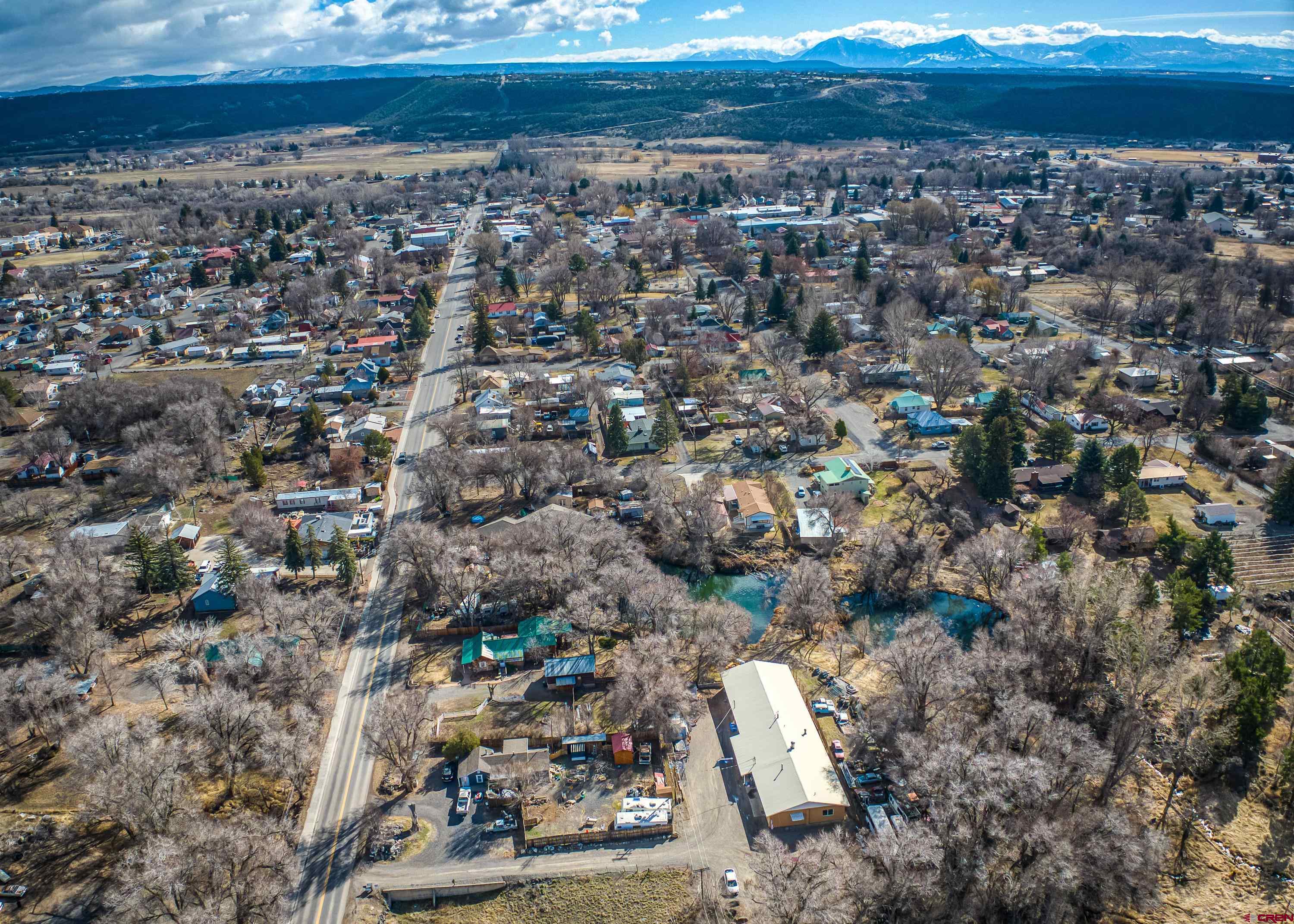 875 West Main Street Cedaredge, CO 81413 - Photo 30 of 35 an aerial view of a residential houses with city view
