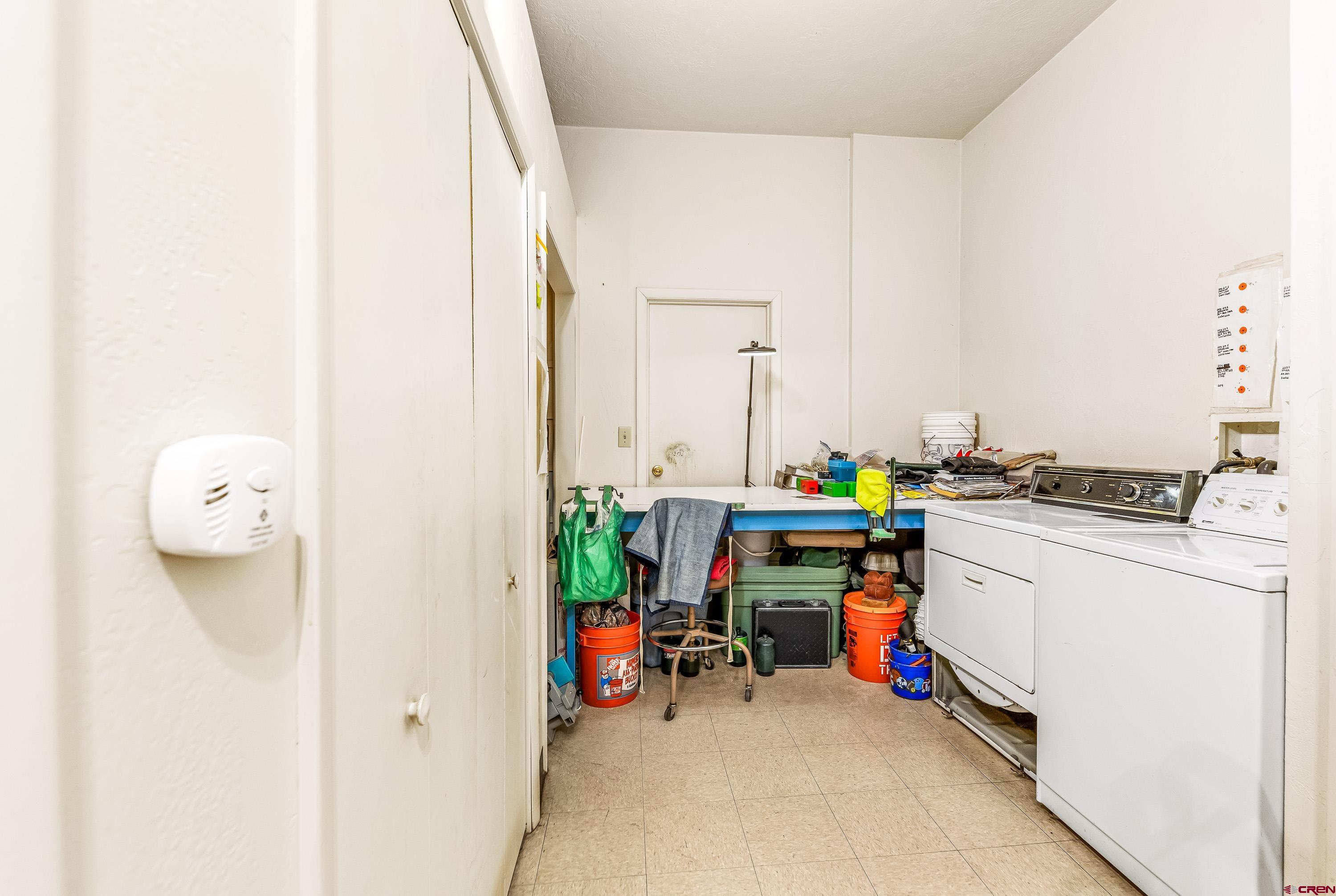 875 West Main Street Cedaredge, CO 81413 - Photo 10 of 35 a utility room with dryer and washer