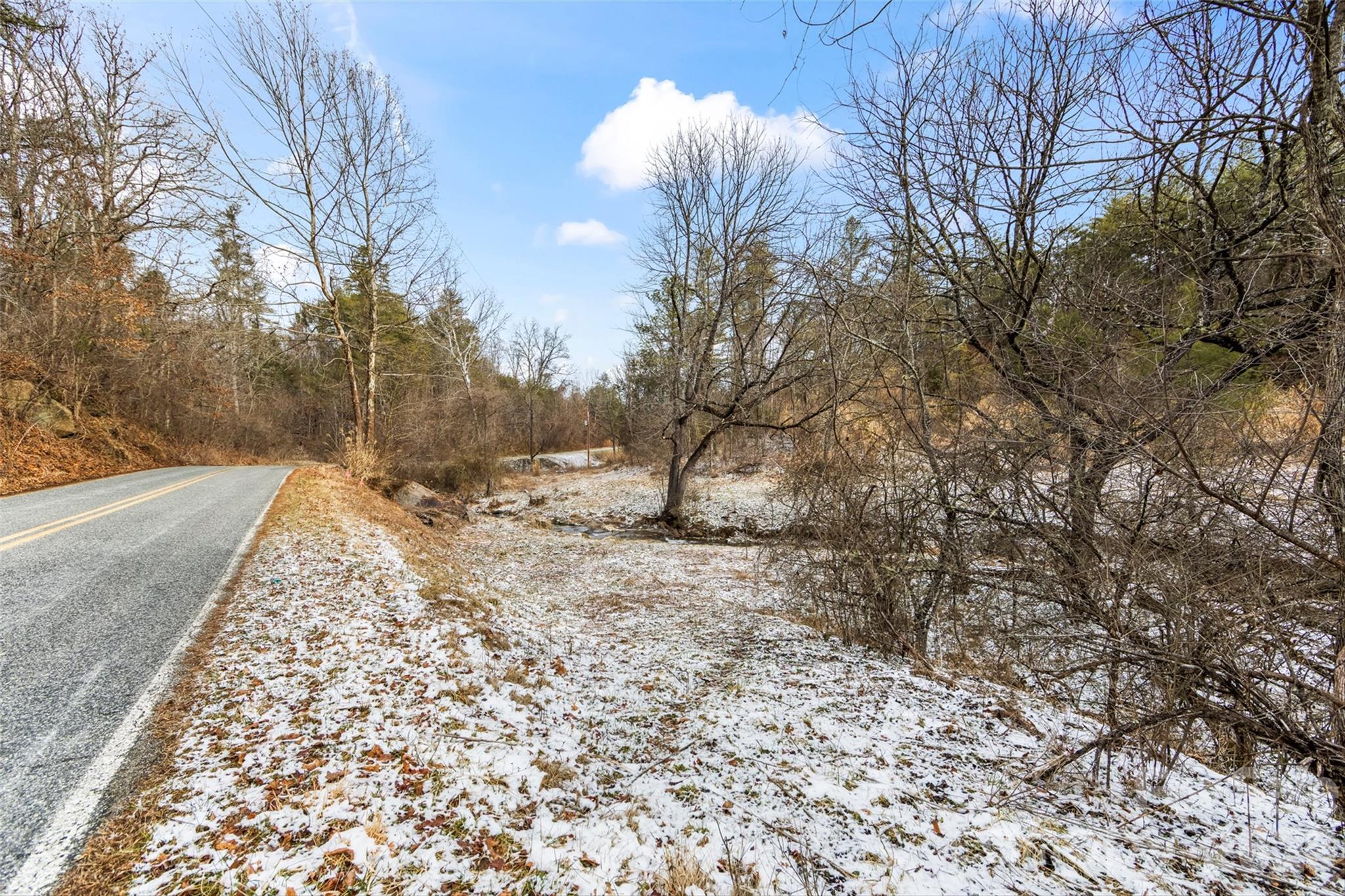Tbd Lower White Oak Road Marshall, NC 28753 - Photo 16 of 18 a view of a yard with snow on the road