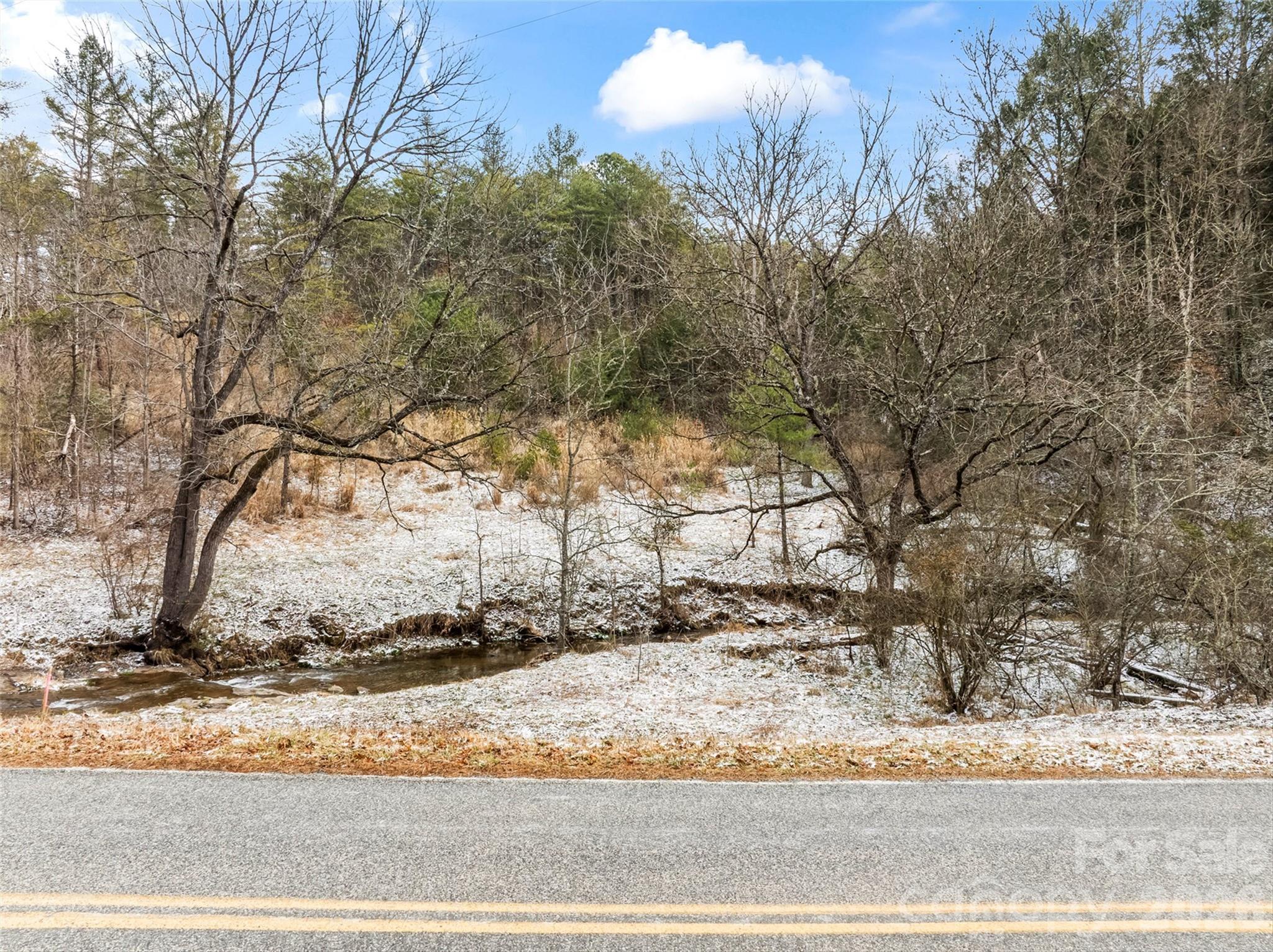 Tbd Lower White Oak Road Marshall, NC 28753 - Photo 17 of 18 a view of a yard covered with snow