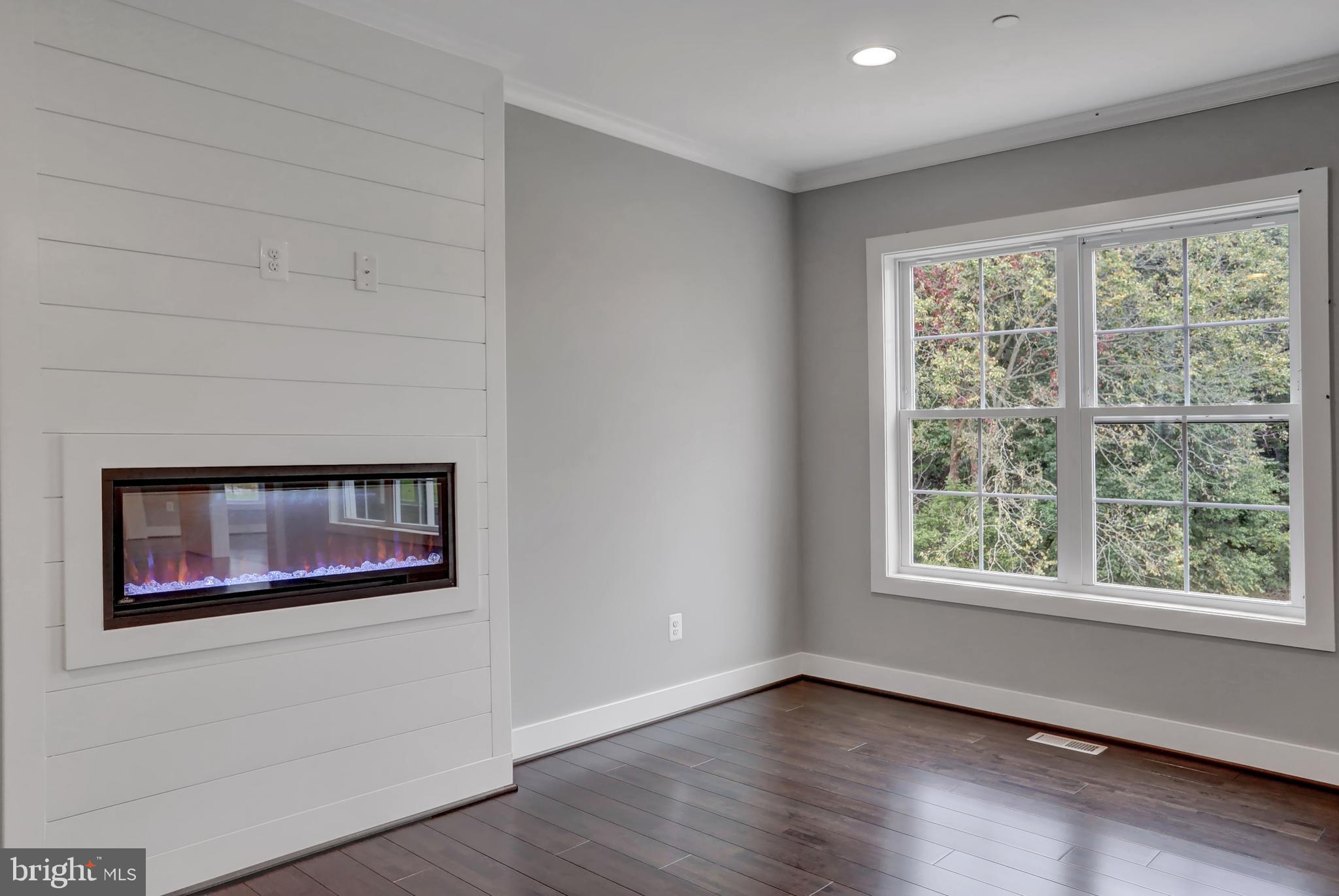 7319 Talbot Run Road Mount Airy, MD 21771 - Photo 15 of 54 The family room has an electric fireplace