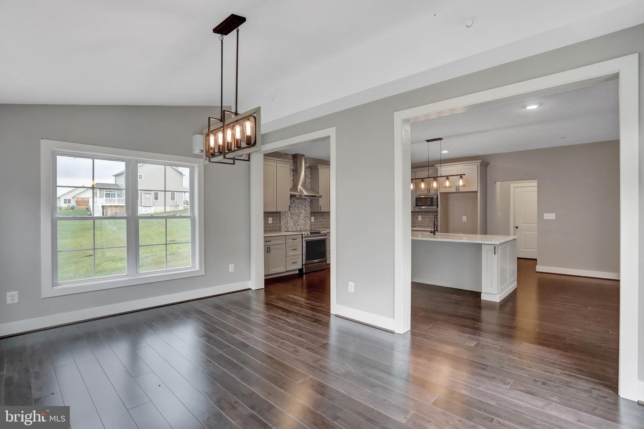7319 Talbot Run Road Mount Airy, MD 21771 - Photo 25 of 54 The sunroom has hardwood floor & vaulted ceiling