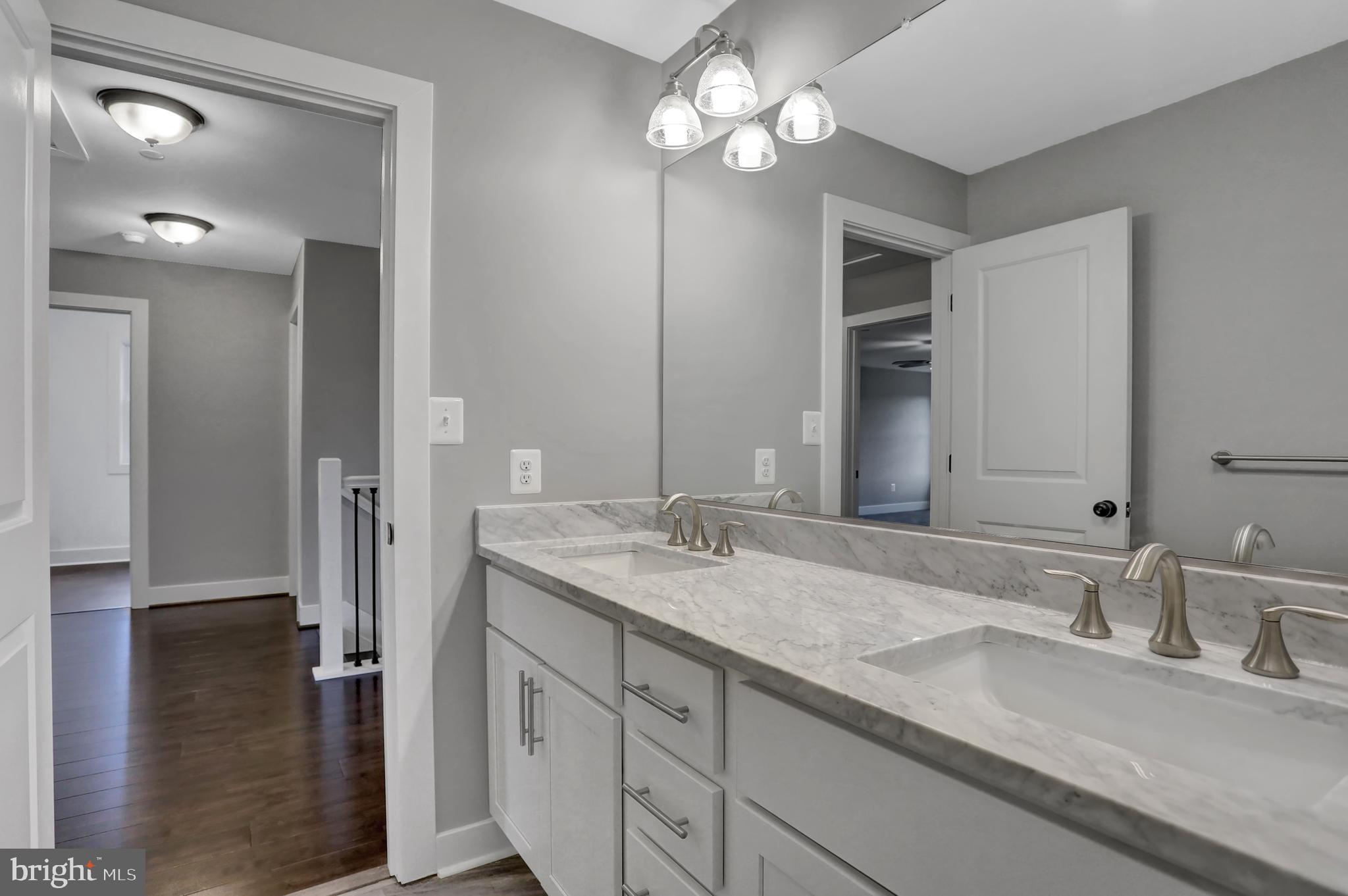 7319 Talbot Run Road Mount Airy, MD 21771 - Photo 38 of 54 Upper level full bathroom has marble counter top
