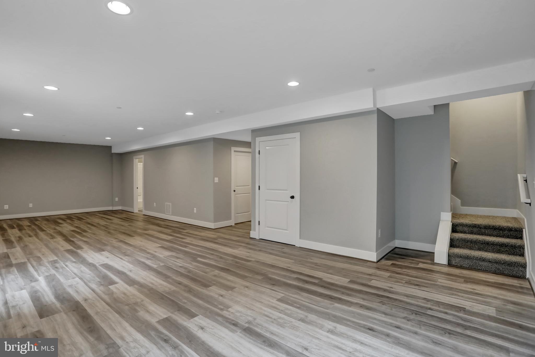 7319 Talbot Run Road Mount Airy, MD 21771 - Photo 45 of 54 The recreation room has vinyl tile floor