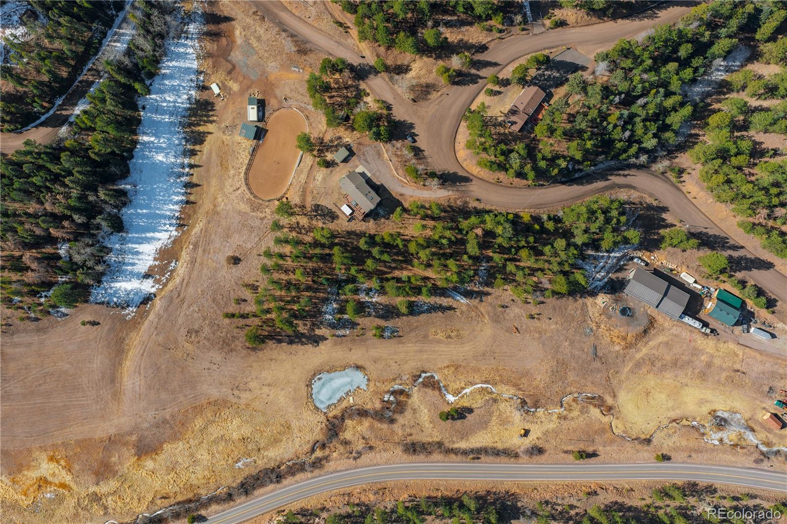 11842 South Geronimo Trail Conifer, CO 80433 - Photo 37 of 41 an aerial view of a house with a yard