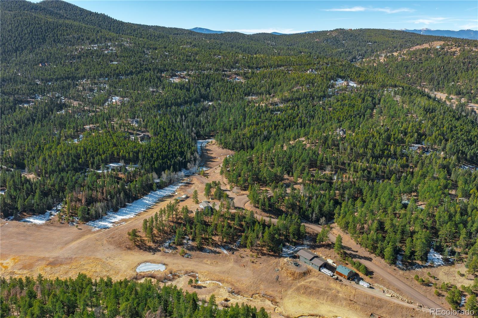 11842 South Geronimo Trail Conifer, CO 80433 - Photo 38 of 41 an aerial view of a house with a yard