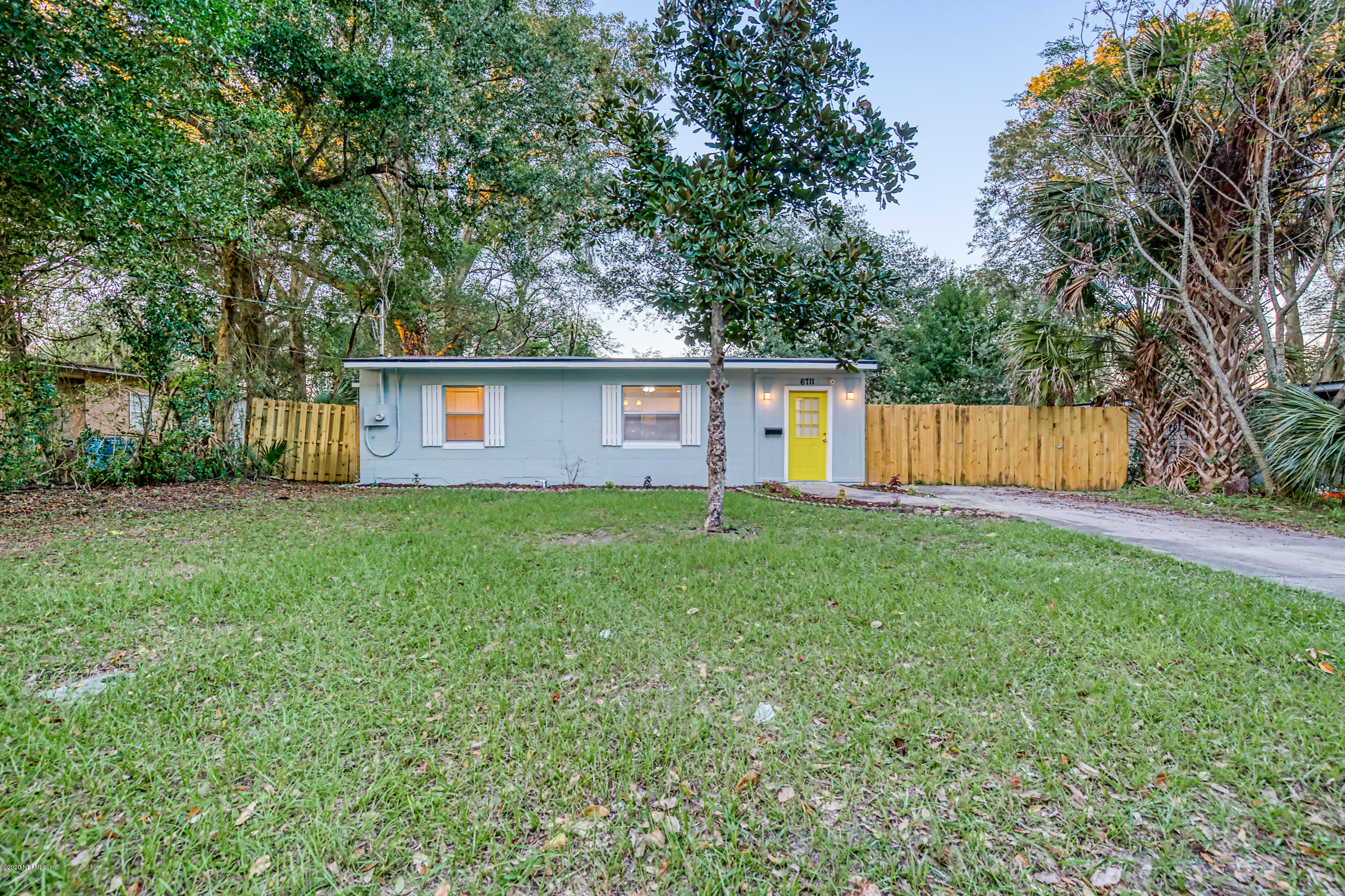 6711 Ryance Road Jacksonville, FL 32211 - Photo 1 of 26 a view of a house with a backyard