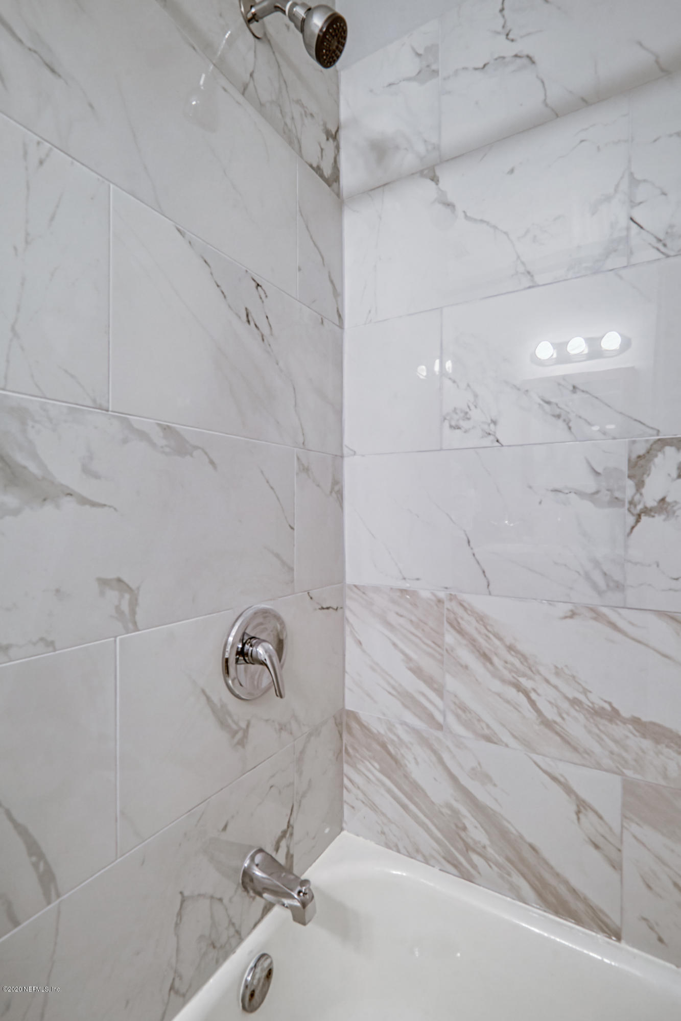 6711 Ryance Road Jacksonville, FL 32211 - Photo 18 of 26 a bathroom with a shower