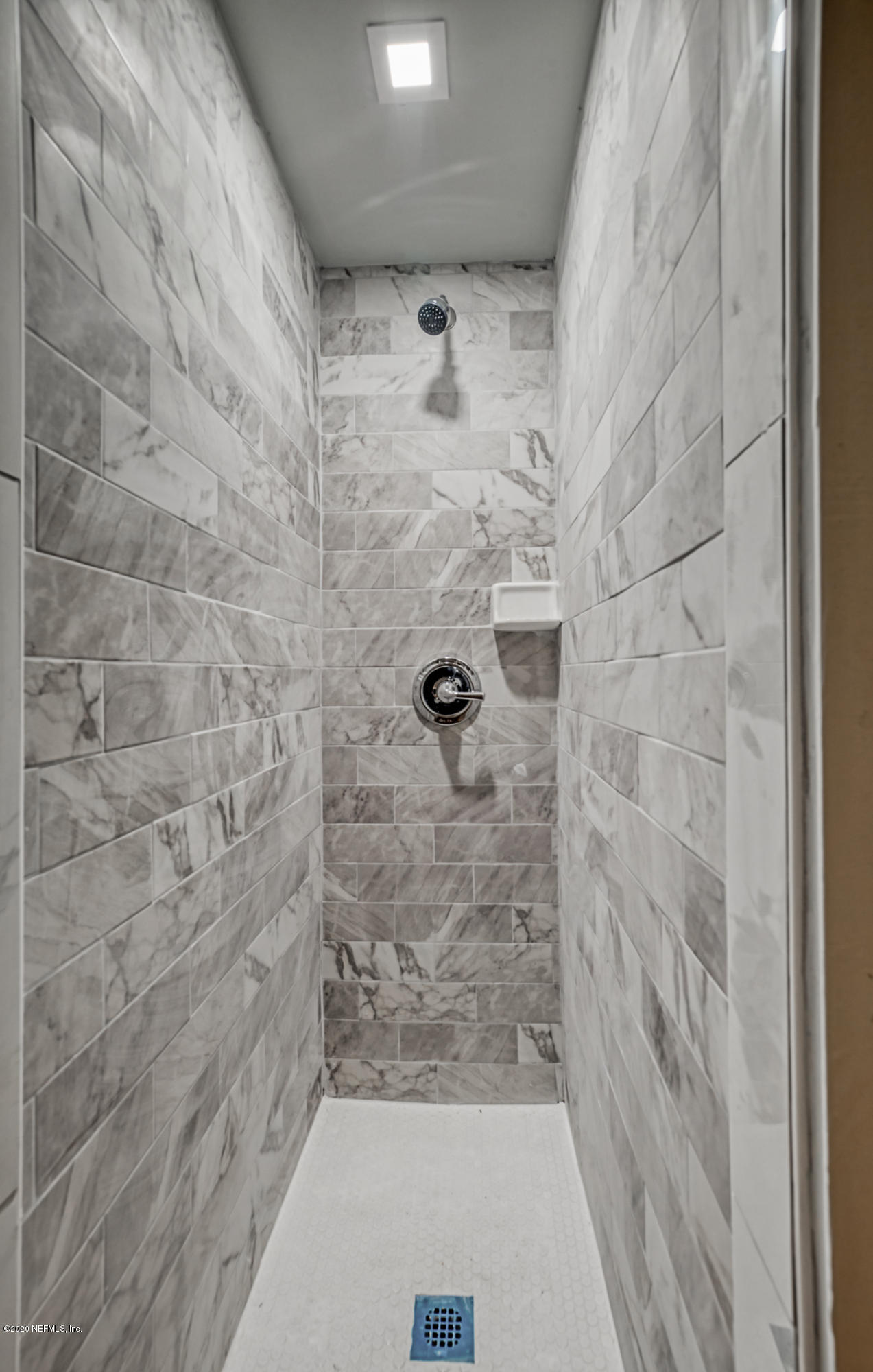 6711 Ryance Road Jacksonville, FL 32211 - Photo 22 of 26 a bathroom with a shower