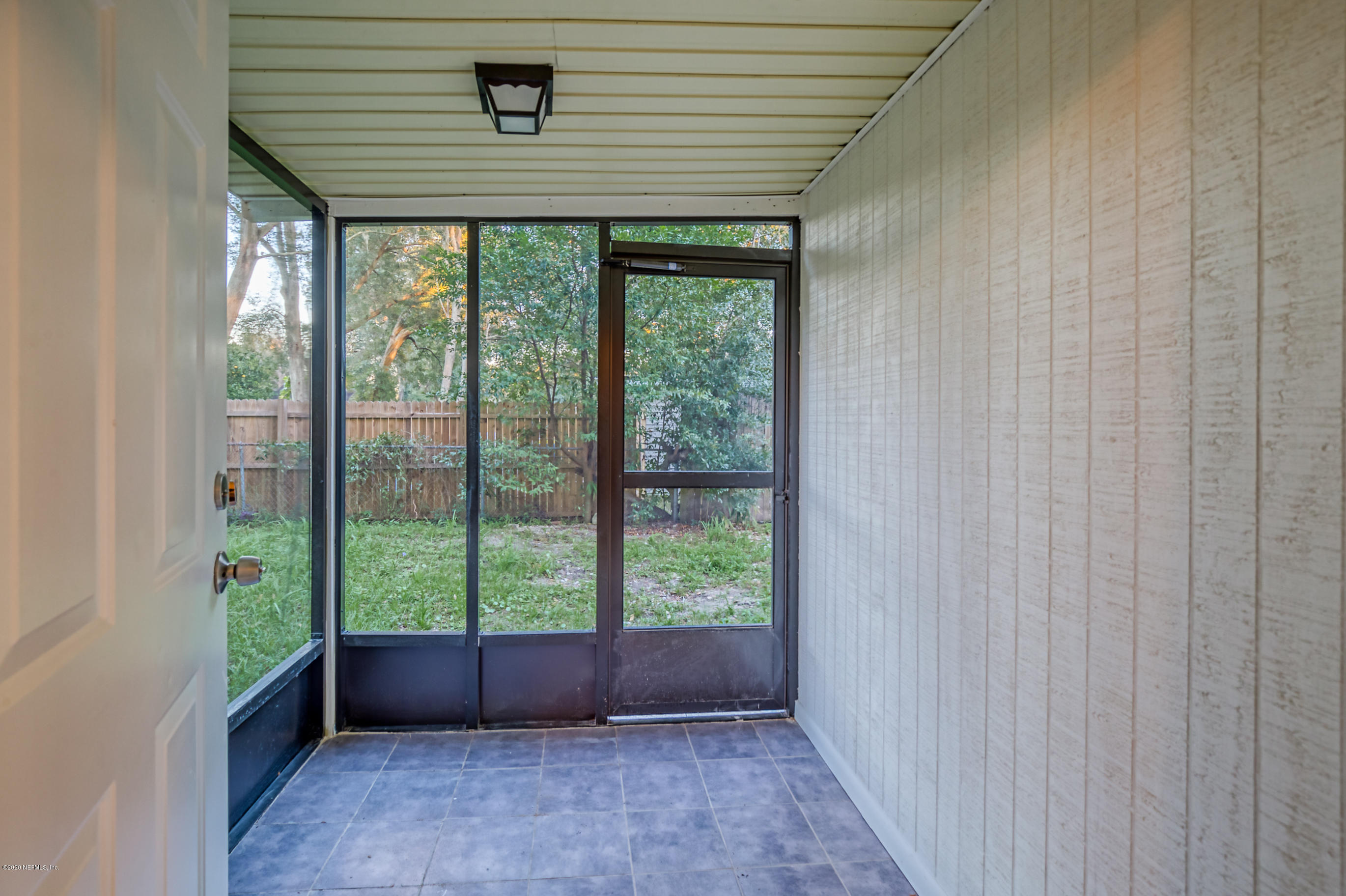 6711 Ryance Road Jacksonville, FL 32211 - Photo 23 of 26 a view of front door and porch