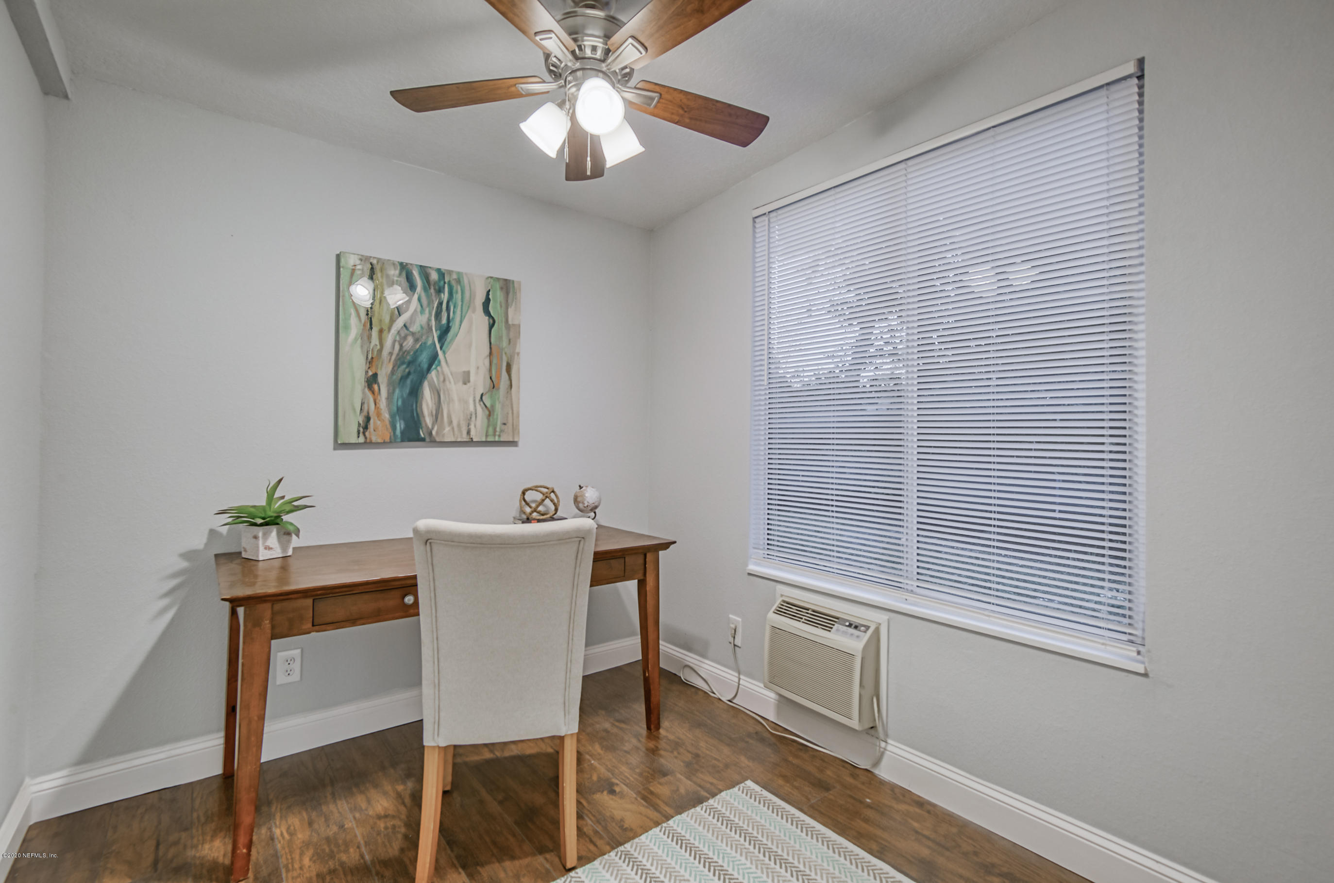 6711 Ryance Road Jacksonville, FL 32211 - Photo 4 of 26 a view of a dining room with furniture window and wooden floor