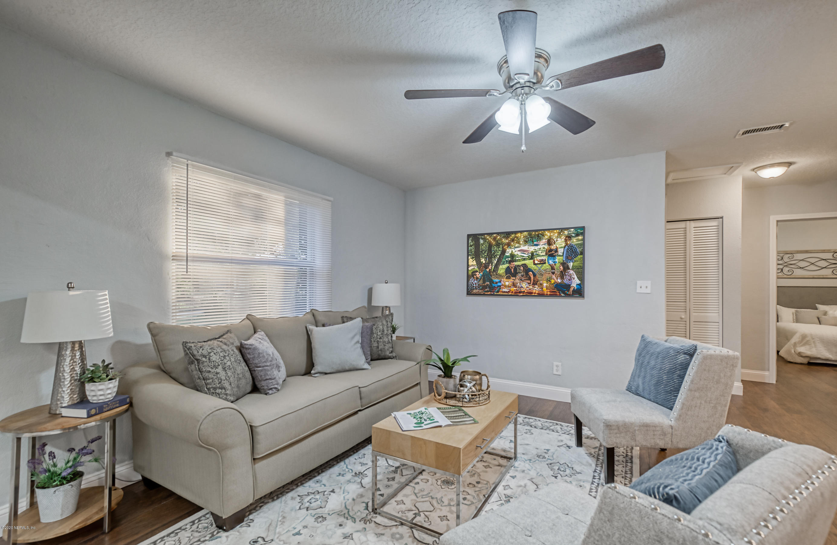 6711 Ryance Road Jacksonville, FL 32211 - Photo 5 of 26 a living room with furniture and a window